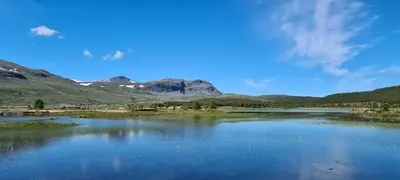 a view of a lake with mountains in the background at Cabin At The Gateway To Jotunheimen in Tessand