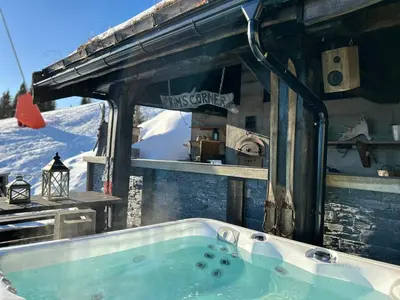 a jacuzzi tub in a building with snow at Fjellhytte Med Panorama På Toppen Av Norefjell in Noresund