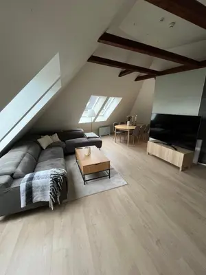 a living room with a couch and a table at Top Appartment in Bergen in Bergen
