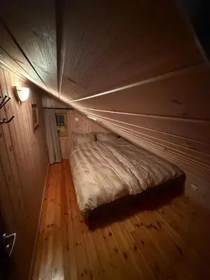 a bed in a tent in a room at Cozy ski in&out cabin Hemsedal in Hemsedal