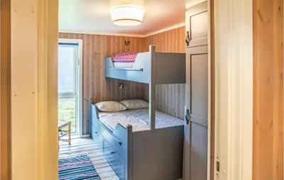 a small room with bunk beds in it at 4 Bedroom Stunning Home In Skjolden in Skjolden