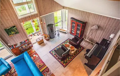 an overhead view of a living room with blue furniture at 4 Bedroom Stunning Home In Skjolden in Skjolden