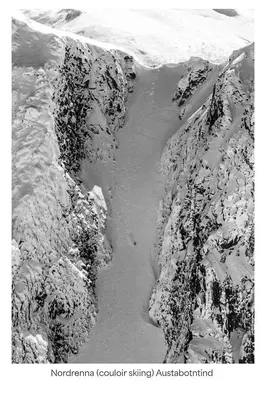a black and white photo of a mountain with snow at Turtagrø Hotel in Fortun