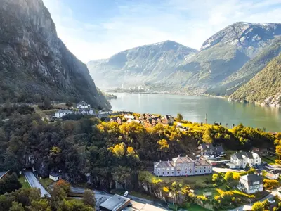 an aerial view of a town in the mountains at Trolltunga Aparthotel in Tysso
