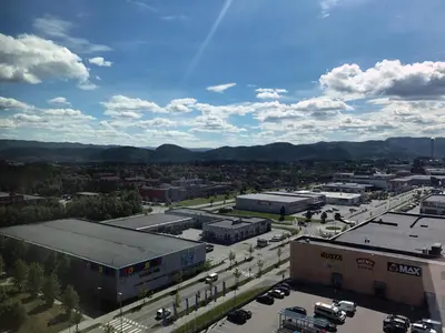 an aerial view of a city with a parking lot at Quality Hotel Panorama in Trondheim