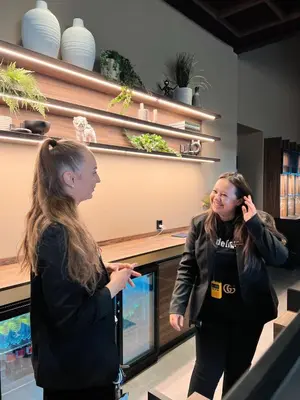 two women standing next to each other in a room at Quality Hotel Panorama in Trondheim