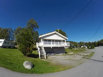 a house on the side of a road at Volsdalen Camping in Ålesund