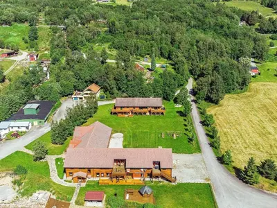 an aerial view of a large house with a yard at 6 person holiday home in EIDSVÅG-By Traum in Rød