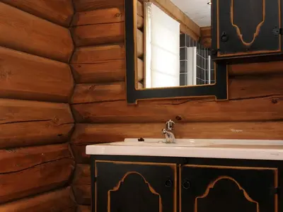 a bathroom with a sink and a mirror at 12 person holiday home in Fåvang-By Traum in Favang