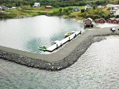 an aerial view of a body of water with a dock at 4 person holiday home in VEVANG-By Traum in Vevang