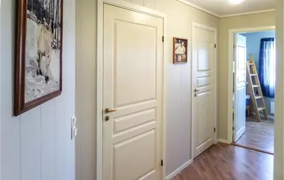a room with a white door and a hallway at 2 Bedroom Gorgeous Home In Sveio in Sveio