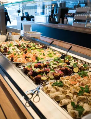 a buffet line with many different types of food at Thon Hotel Vinstra in Vinstra