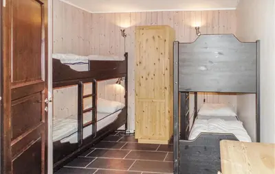 a room with two bunk beds and a door at Gorgeous Apartment In Hemsedal in Hemsedal