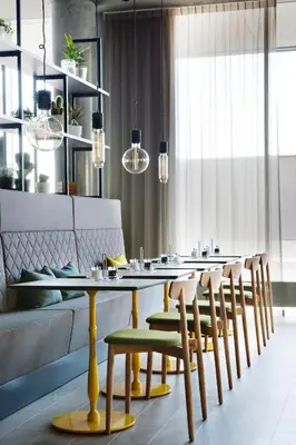a dining room with a table and chairs at Comfort Hotel Bergen Airport in Bergen