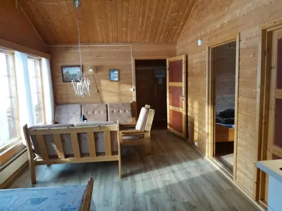 a living room with a couch and a table at Magalaupe Camping in Oppdal