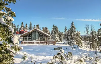 a cabin in the snow with snow covered trees at Sjusjøen-Pihl 89 in Sjusjøen