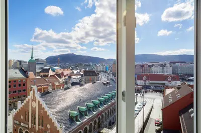 a view of a city from a window at Bergen Harbour Hotel, WorldHotels Crafted in Bergen