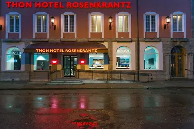 a hotel with a sign on the front of a building at Thon Hotel Rosenkrantz Bergen in Bergen