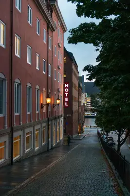 a cobblestone street in a city with buildings at Thon Hotel Rosenkrantz Bergen in Bergen