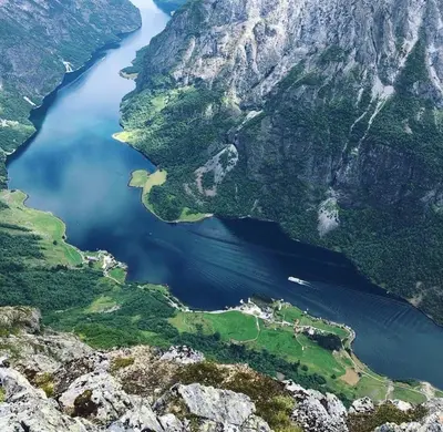 an aerial view of a lake in the mountains at Gudvangen Fjordtell in Gudvangen