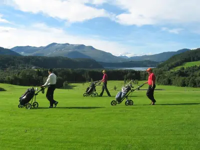 a group of people walking with their babies and strollers at Frich`s Hotel Surnadal in Surnadal