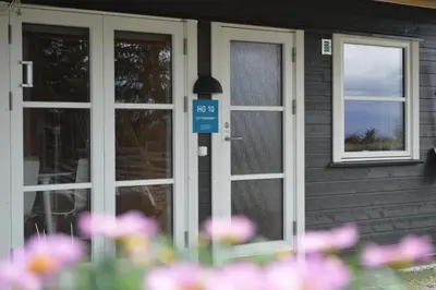 a door to a house with a sign on it at Nordseter Fjellpark, Hyttegrend in Nordseter