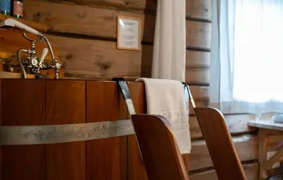 a kitchen with a sink and a towel on a counter at Røisheim Hotel & Skysstasjon in Lom