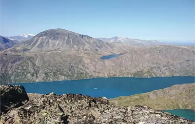 a view from the top of a mountain with a lake at Amazing Home In Vågå With Kitchen in Vaga