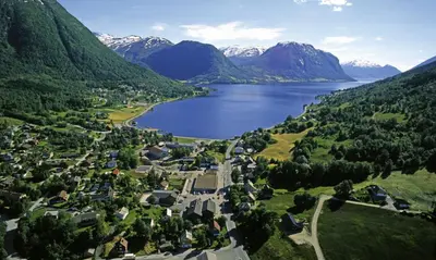 an aerial view of a small town next to a lake at Grand Hotel Skei - Unike Hoteller in Skei
