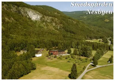 an aerial view of a resort in the mountains at Smedsgården Hotel in Nesbyen
