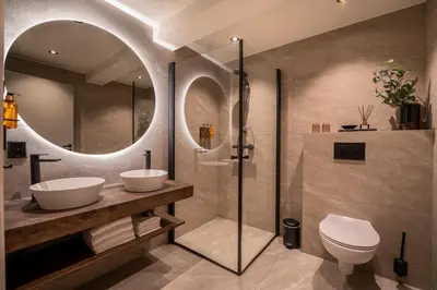 a bathroom with a shower and a sink and a toilet at Lillehammer Turistsenter Budget Hotel in Lillehammer