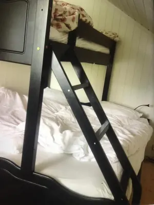 a ladder on a bunk bed in a room at Remestøylflotti Hyttegrend in Hovden