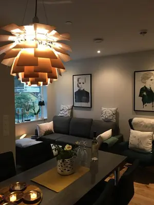 a living room with a couch and a table at Førde in Førde