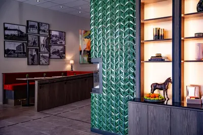 a lobby with a horse statue on a counter at Quality Hotel Prinsen in Trondheim