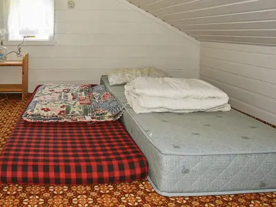 two mattresses sitting in a room with at 7 person holiday home in Selje-By Traum in Selje