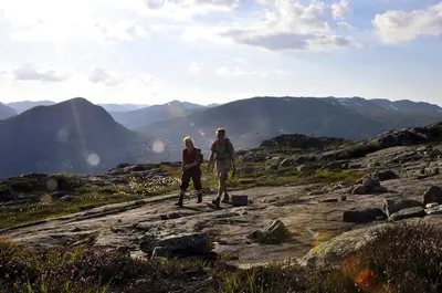 a man and woman standing on top of a mountain at Hovden Fjellstoge in Hovden