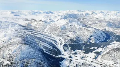 an aerial view of a snow covered mountain range at Storehorn Apartments in Hemsedal