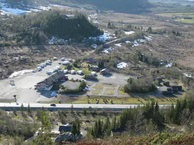 an aerial view of a parking lot at a ski resort at Fjellstova Ørskogfjellet Cottages in Sjøholt