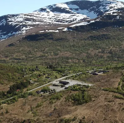 an aerial view of a mountain with snow at Fjellstova Ørskogfjellet Cottages in Sjøholt