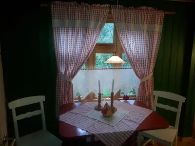 a dining room table with candles on top of it at Skjerping gård in Lonevåg