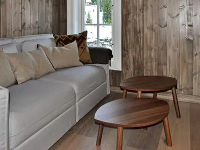 a living room with a couch and a table at 5 person holiday home in Fåvang-By Traum in Favang
