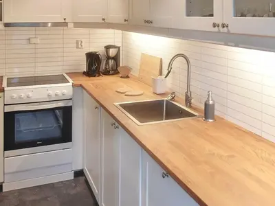 a kitchen with a sink and a counter top at 8 person holiday home in Masfjordnes-By Traum in Masfjorden
