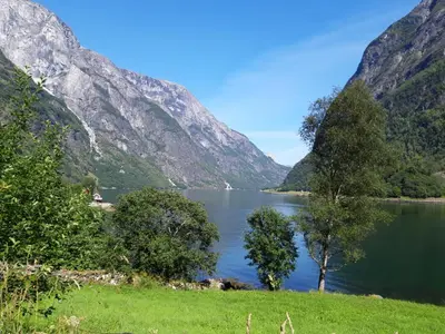 a view of a lake between two mountains at Stalheim Fjord og Fjellhytter in Stalheim