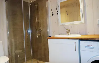 a bathroom with a shower and a sink at Cozy Home In Lillehammer With Wifi in Lillehammer