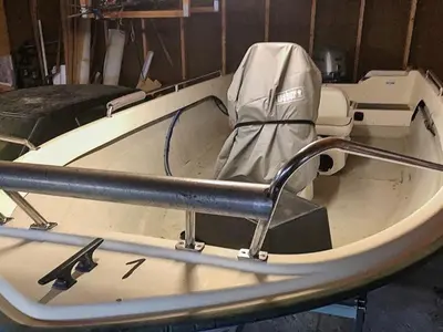 a boat with a seat in the back of it at 6 person holiday home in Aukra in Aukra