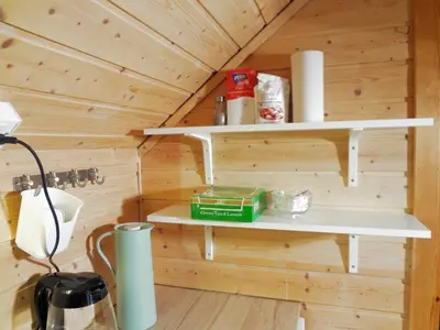 a room with shelves in a wooden cabin at Fully equipped flat, 2 bedrooms, FREE car parking. in Trondheim