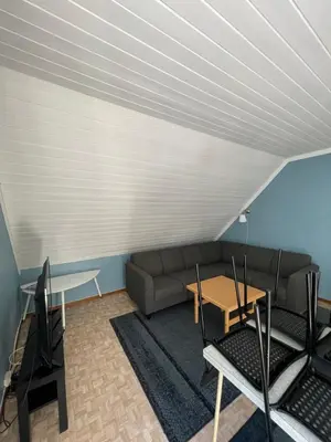 a living room with a couch and a table at Kvam - Stegastein in Aurland