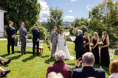 a bride and groom at their wedding ceremony at Thorbjørnrud Hotell in Jevnaker