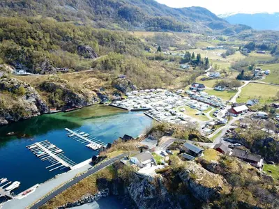 an aerial view of a marina in the mountains at Kyrping Camping in Kyrping