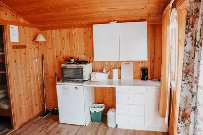 a kitchen with a counter and a microwave at Lyngmo Hytter in Hafslo